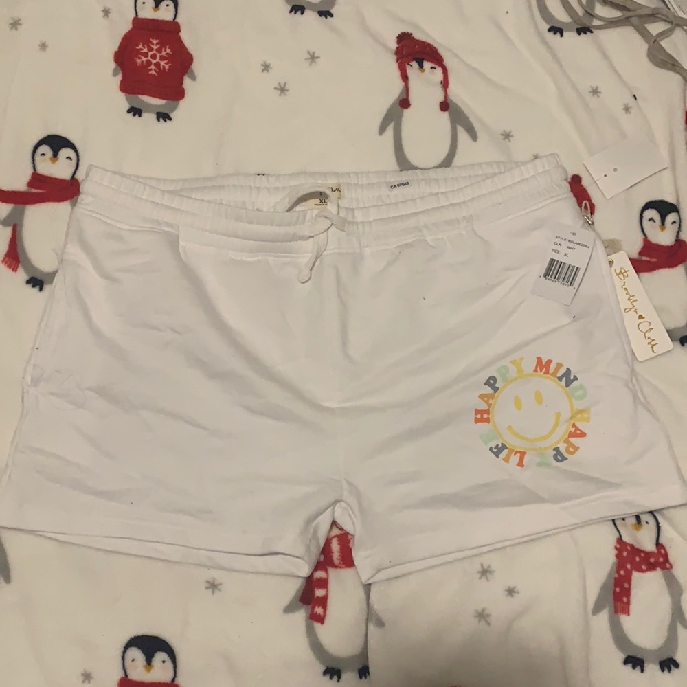 These shorts are white comfortable never worn brand is Brooklyn cloth stretchy